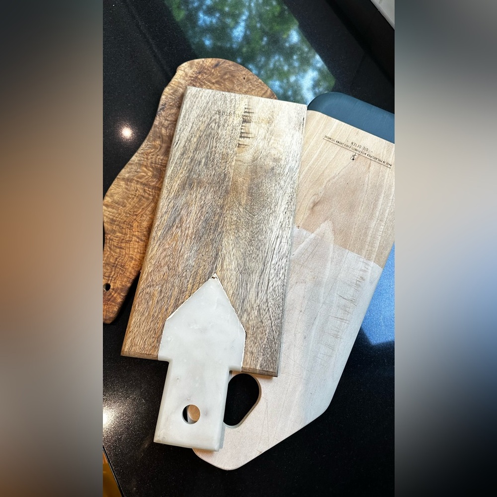 Three wooden cutting boards (used in good condition) for $75!